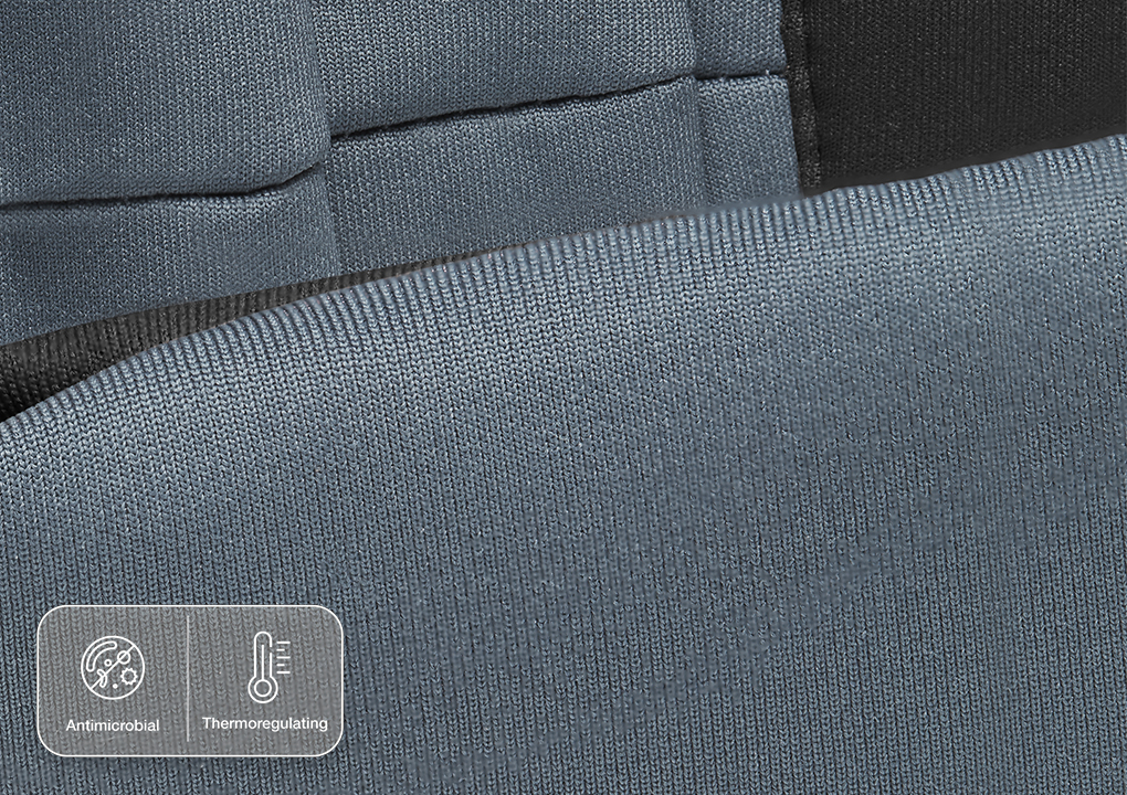 A close view of a travel sleep mask in blue with an antimicrobial fabric.
