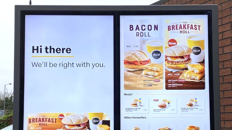 photo of McDonald’s digital menu board during breakfast time 
