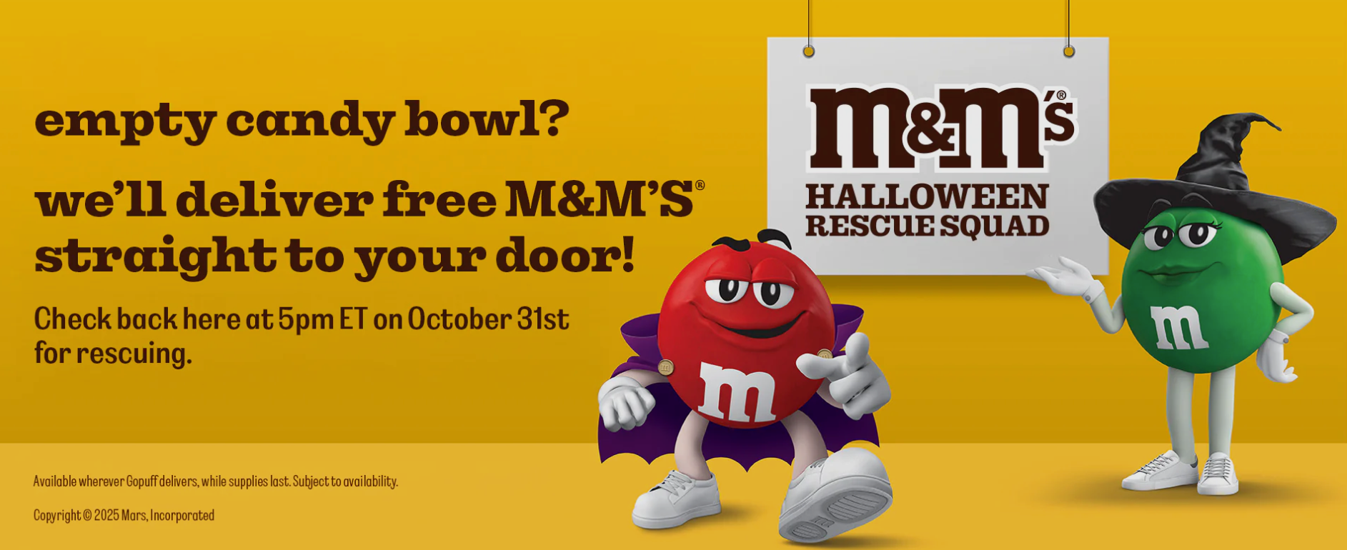M&Ms 2025 Halloween rescue squad banner with a yellow background and red and green M&M on the front in costume