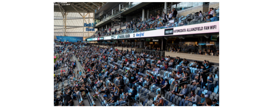 Ribbon displays are placed above and below fan seats in a stadium