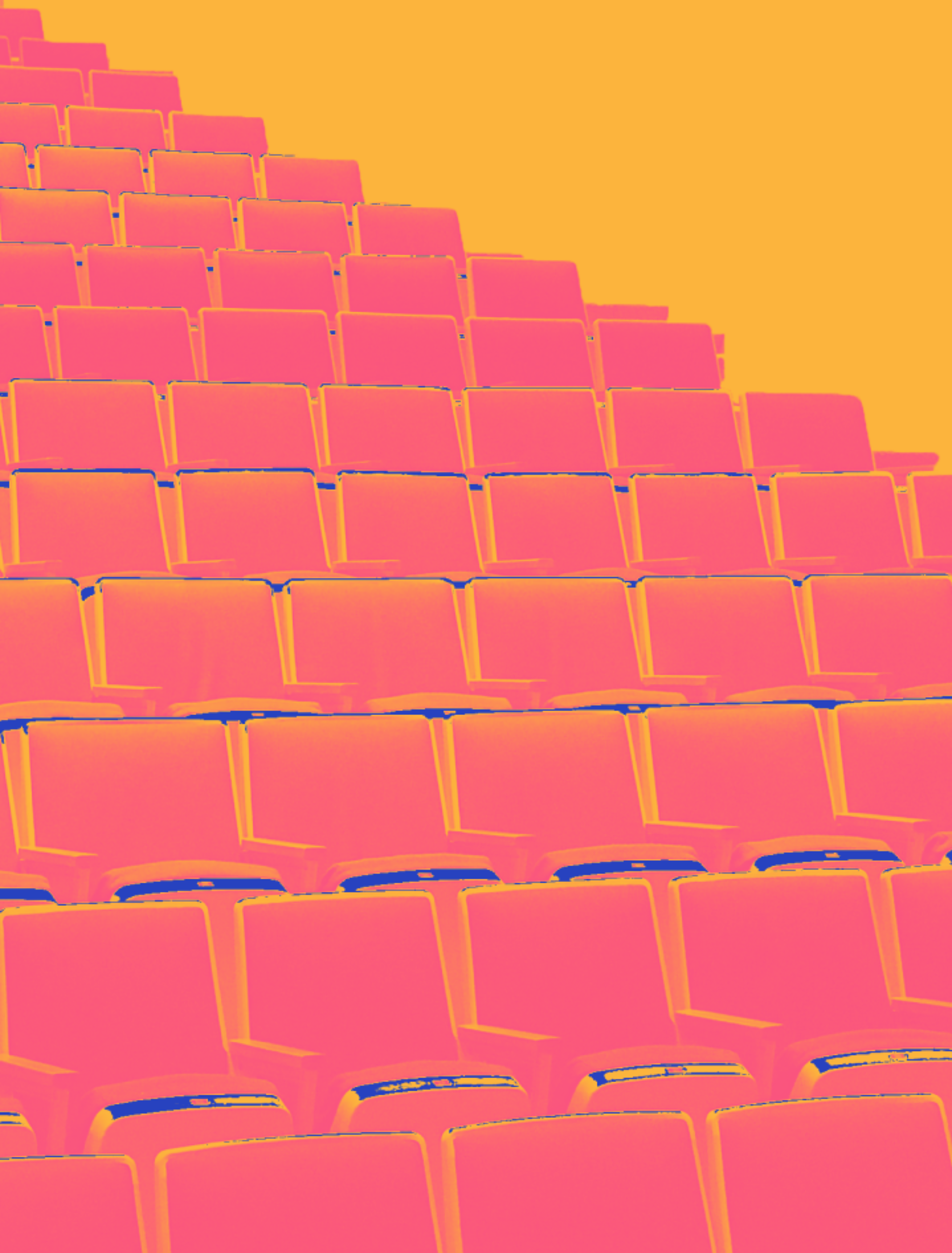An image of rows of seats in a theater, meant to covey the idea of an audience.