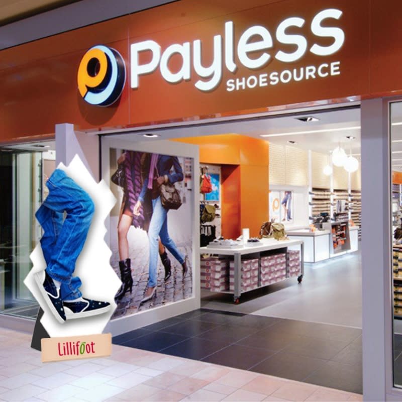 payless shoe store with cardboard cutout of a person in jeans wearing new sneakers propped outside the store  