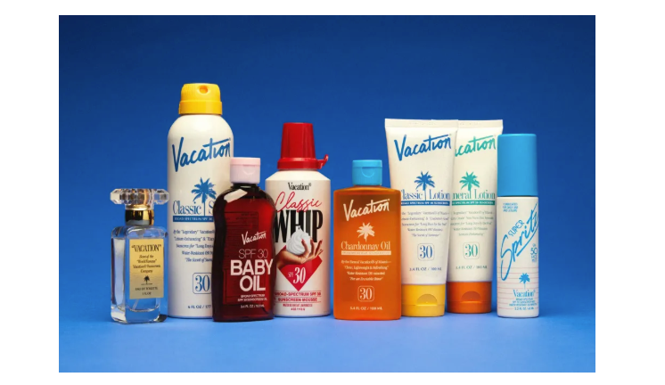 Image of Vacation brand line of SPF products on a blue background