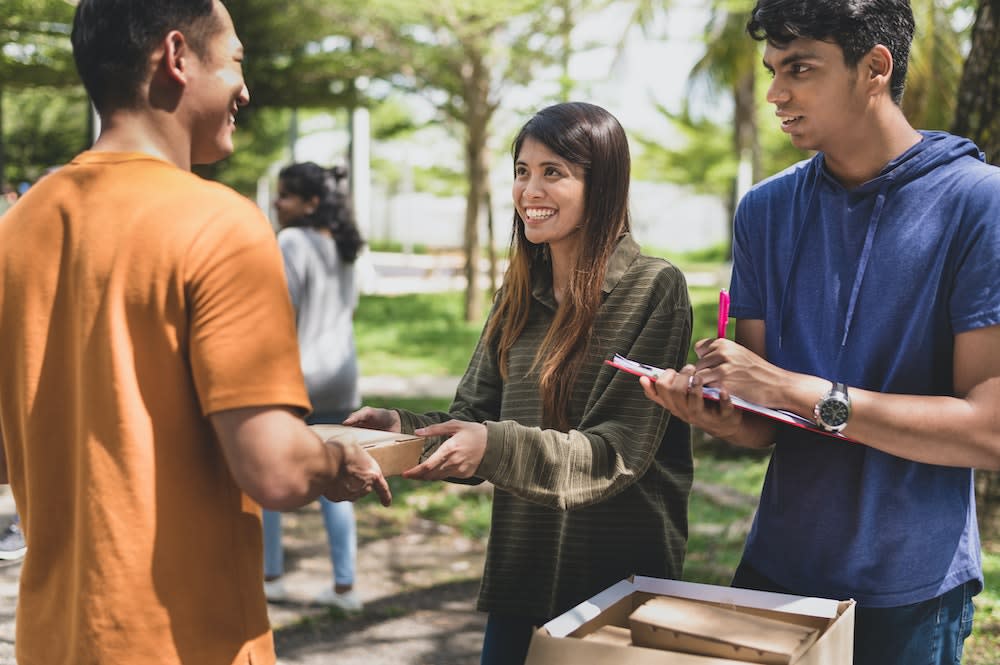 People enjoying community service