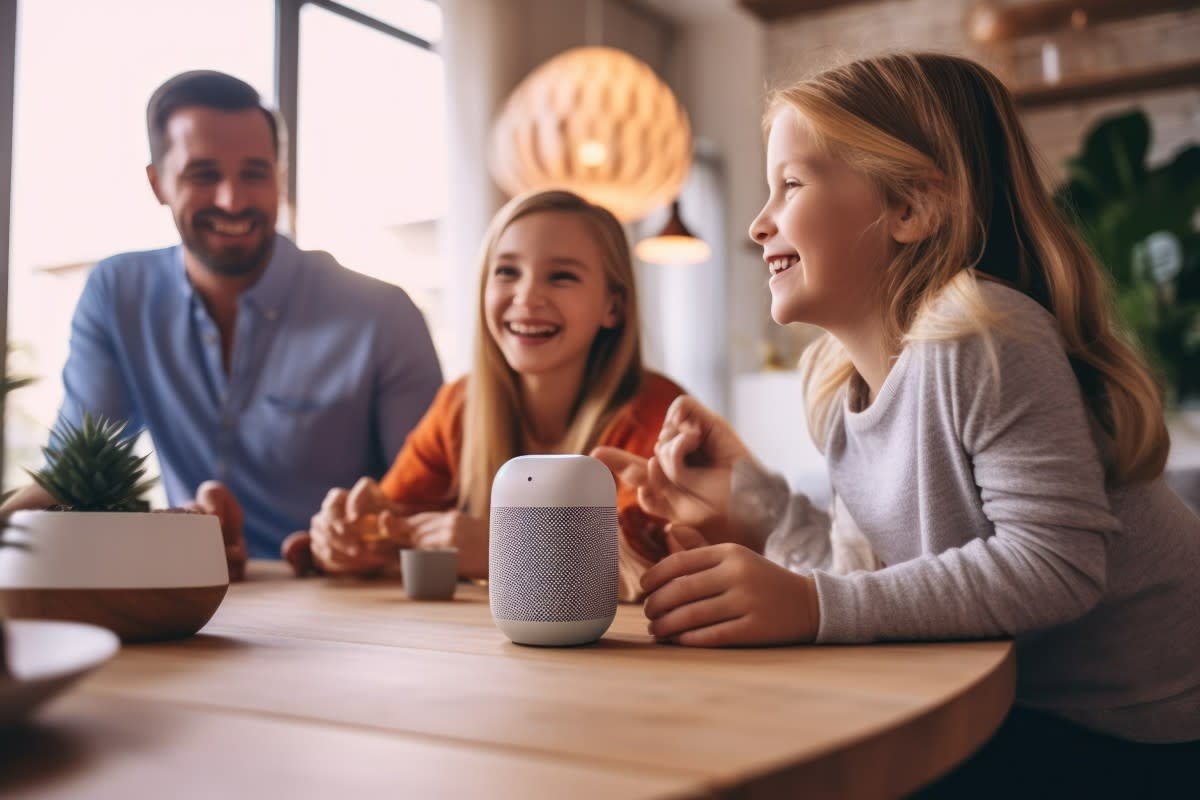 kids at table with smart device