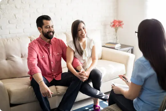 man and woman on couch