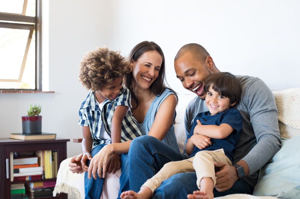 A family laughing with each other 