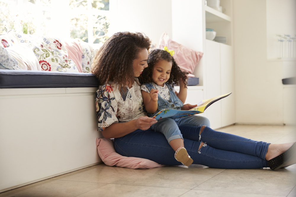 Mom and child reading.