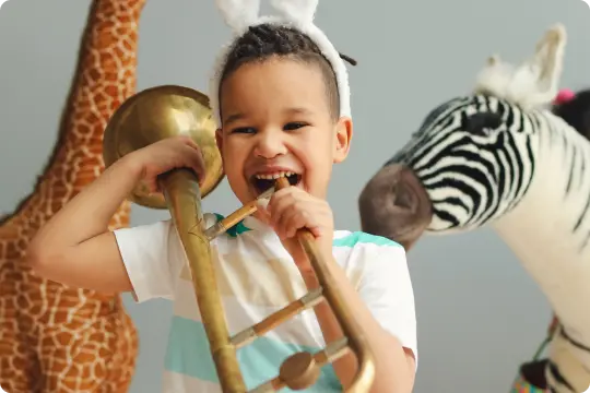 child with trombone