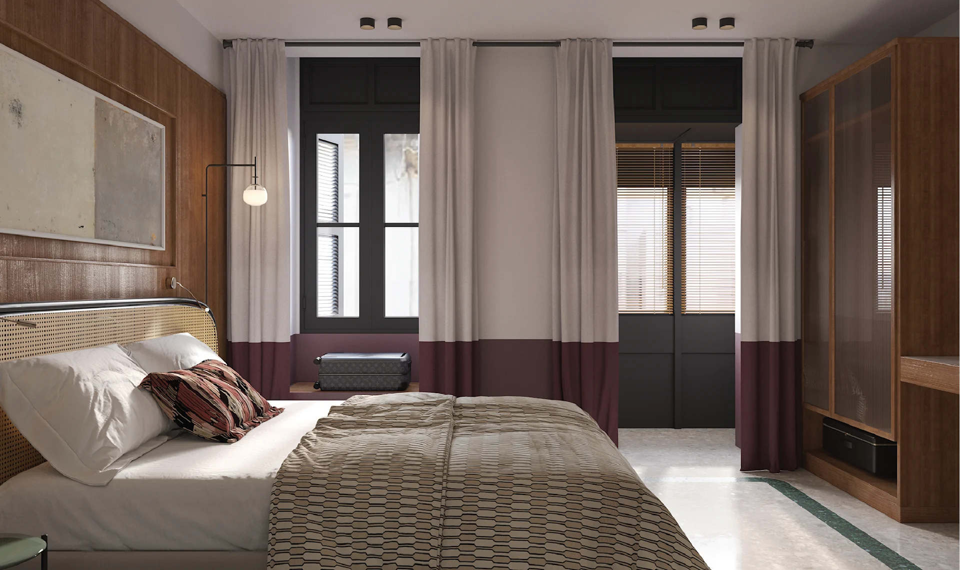 A stylishly designed hotel bedroom featuring a rattan-headboard bed with patterned bedding, warm walnut wood wall panelling, floor-to-ceiling dark-framed windows with two-toned cream and burgundy curtains, and terrazzo flooring with a green inlay strip.