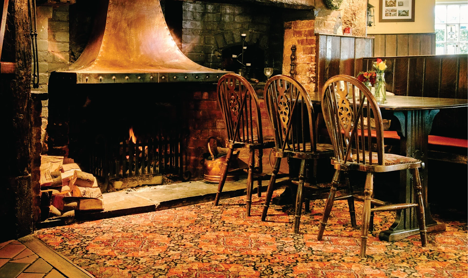 Ye Olde Fighting Cocks in St Albans, dating to the 8th century, known as one of England’s oldest pubs with a historic timber interior