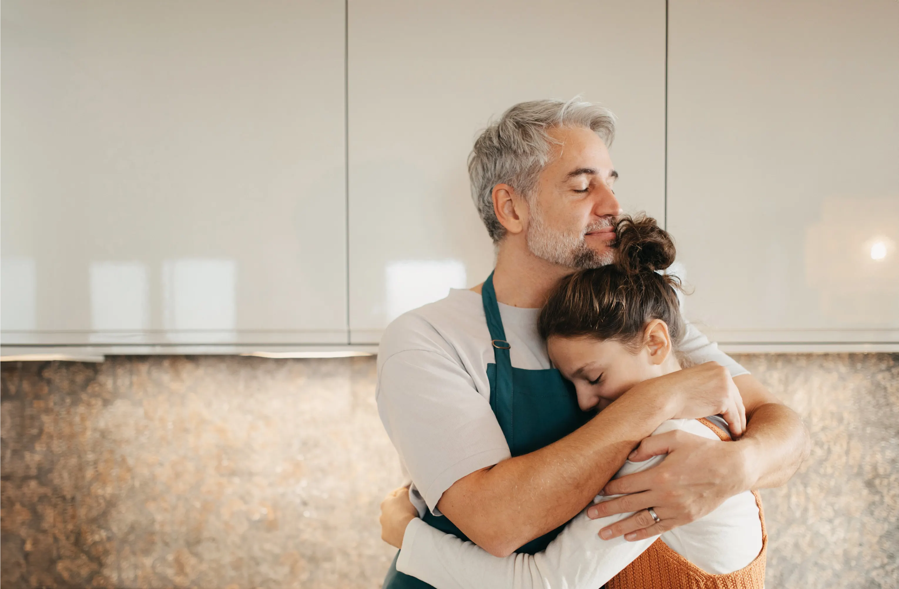 A patient hugging his family member - Cardiac genetic testing information