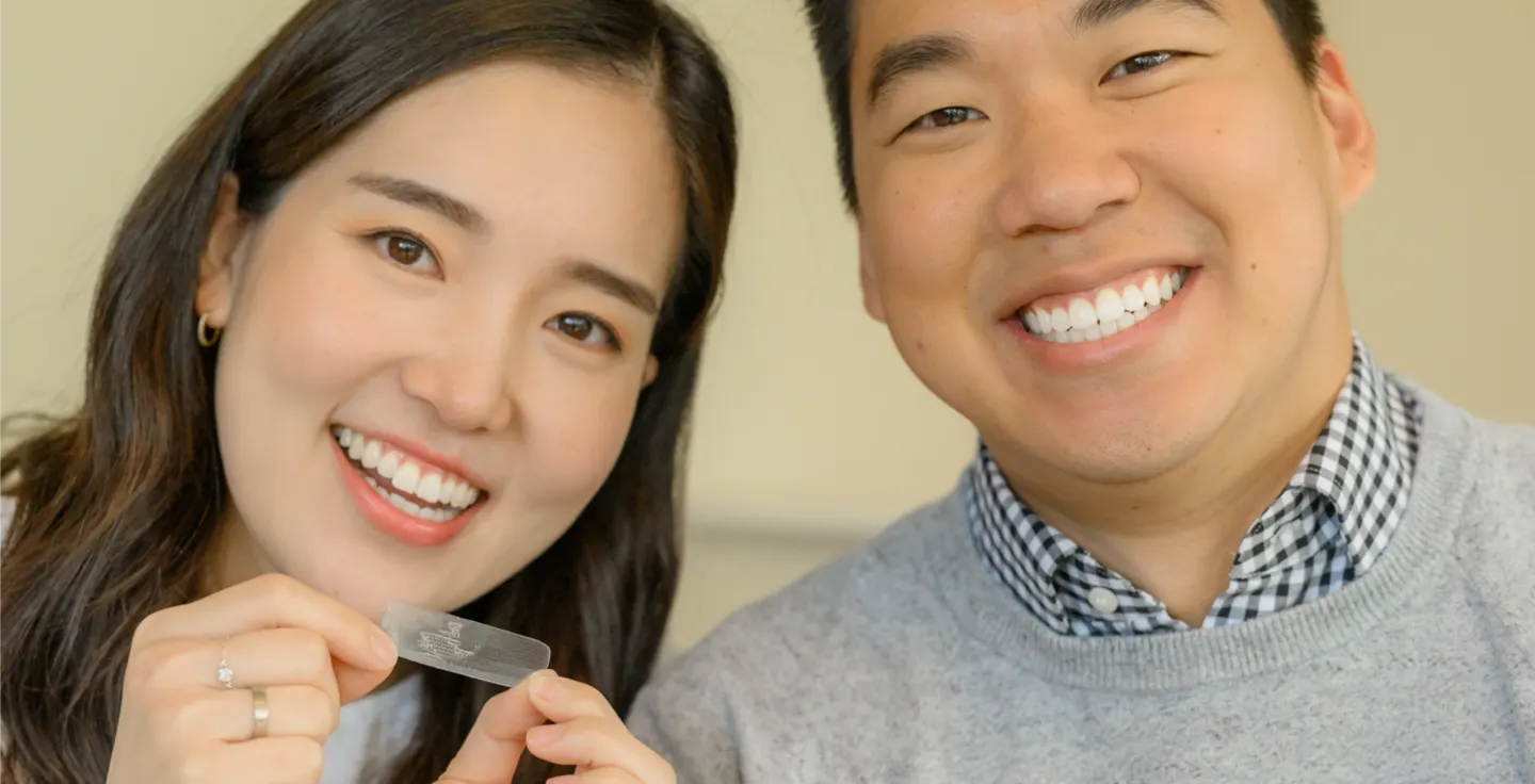 A Man and Women smiling 