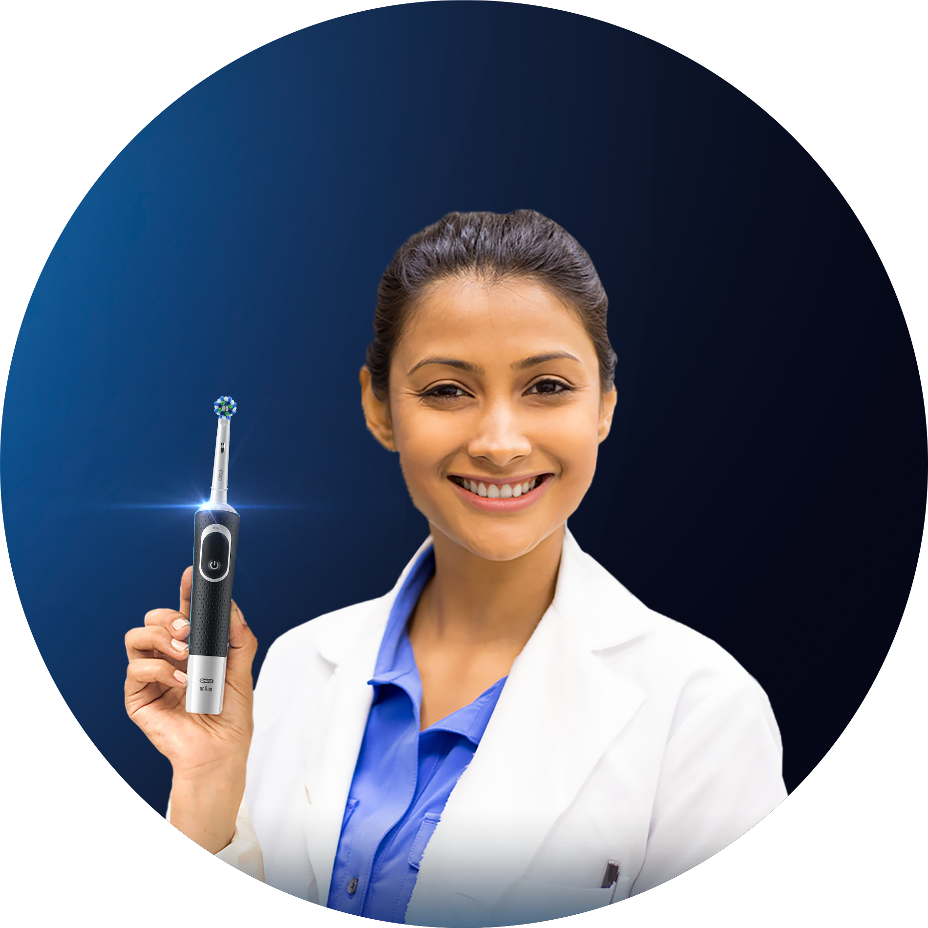 small girl holding oralB brush