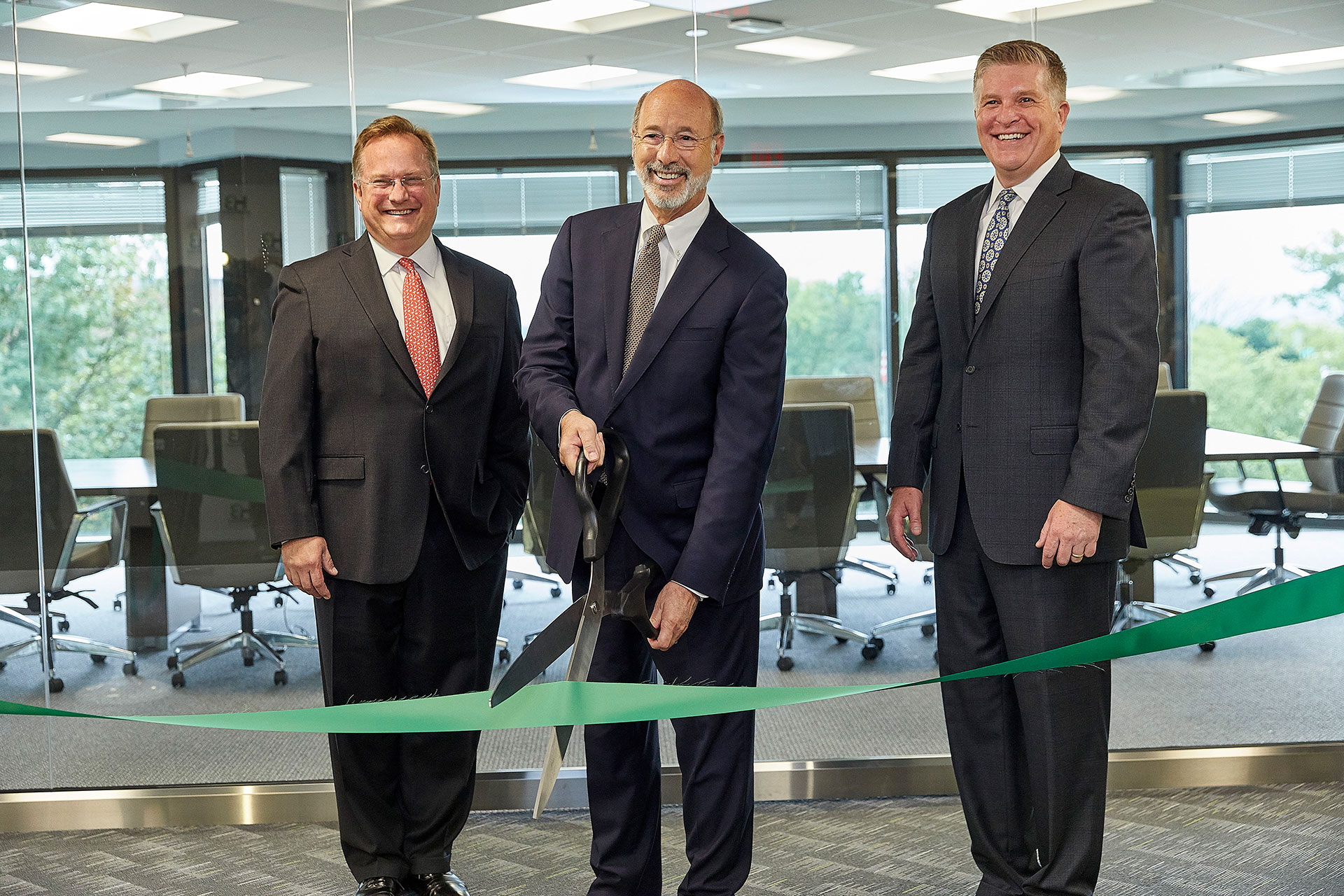 Harmony Biosciences, LLC welcomes Pennsylvania Governor Tom Wolf to cut the ribbon at the company’s official opening of its new headquarters in Plymouth Meeting, Pennsylvania. Pictured here (left to right) are Chris Molineaux, President and CEO of Life Sciences PA, Governor Wolf and John C. Jacobs, President and CEO of Harmony Biosciences