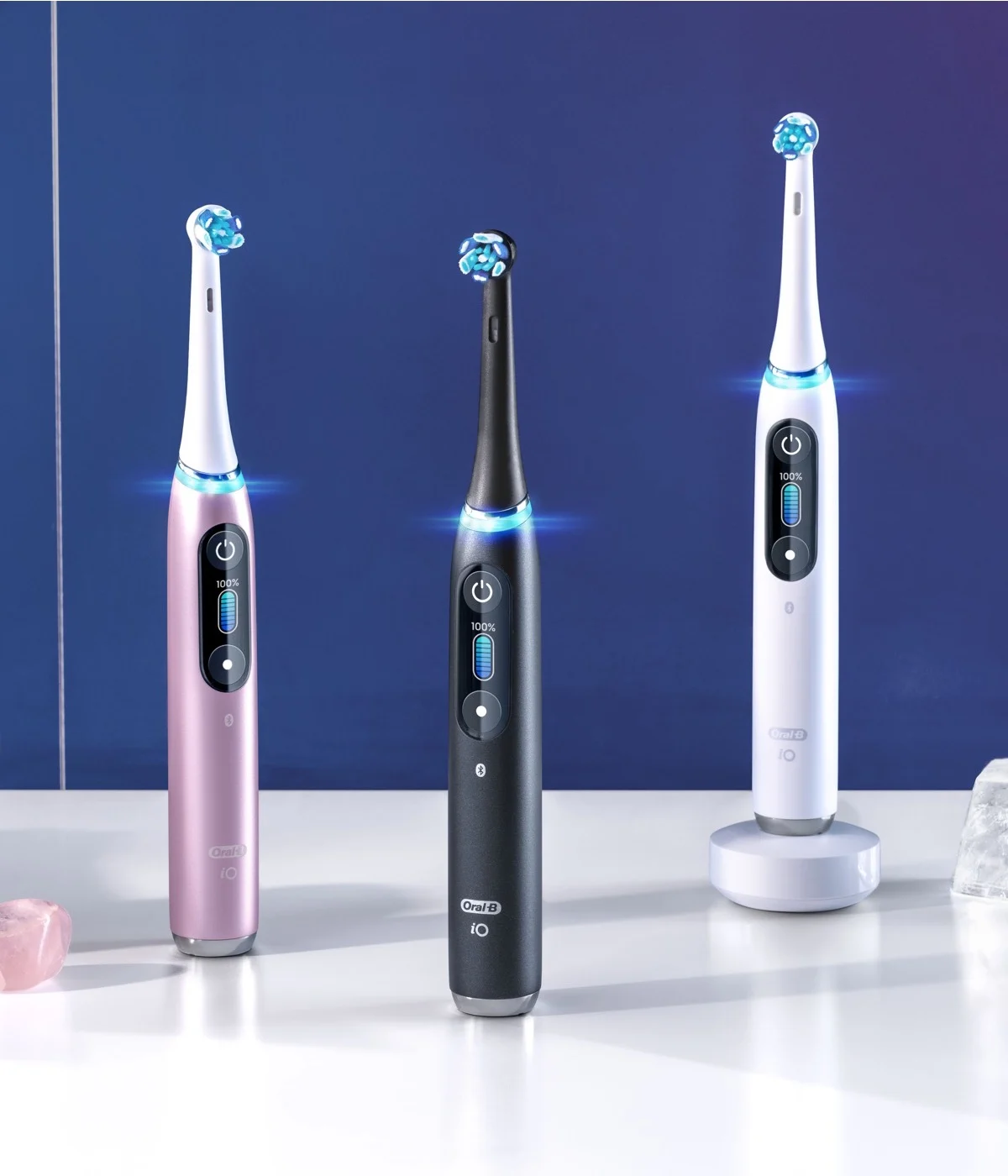 Happy Female Holding Orchid Purple Oral-B iO Electric Toothbrush 