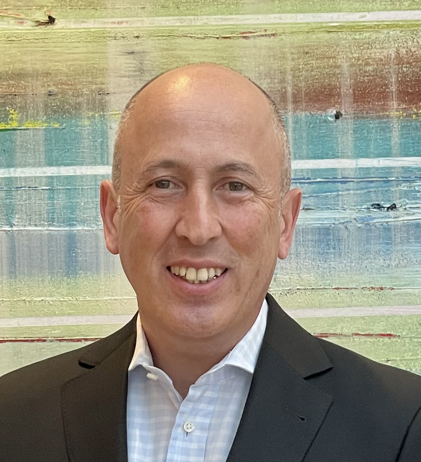 Portrait of 
            Dr.
            Mani
            Rafii
            