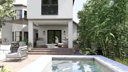 Backyard with small pool, lush bamboo plants, and a two-story home with covered terrace.