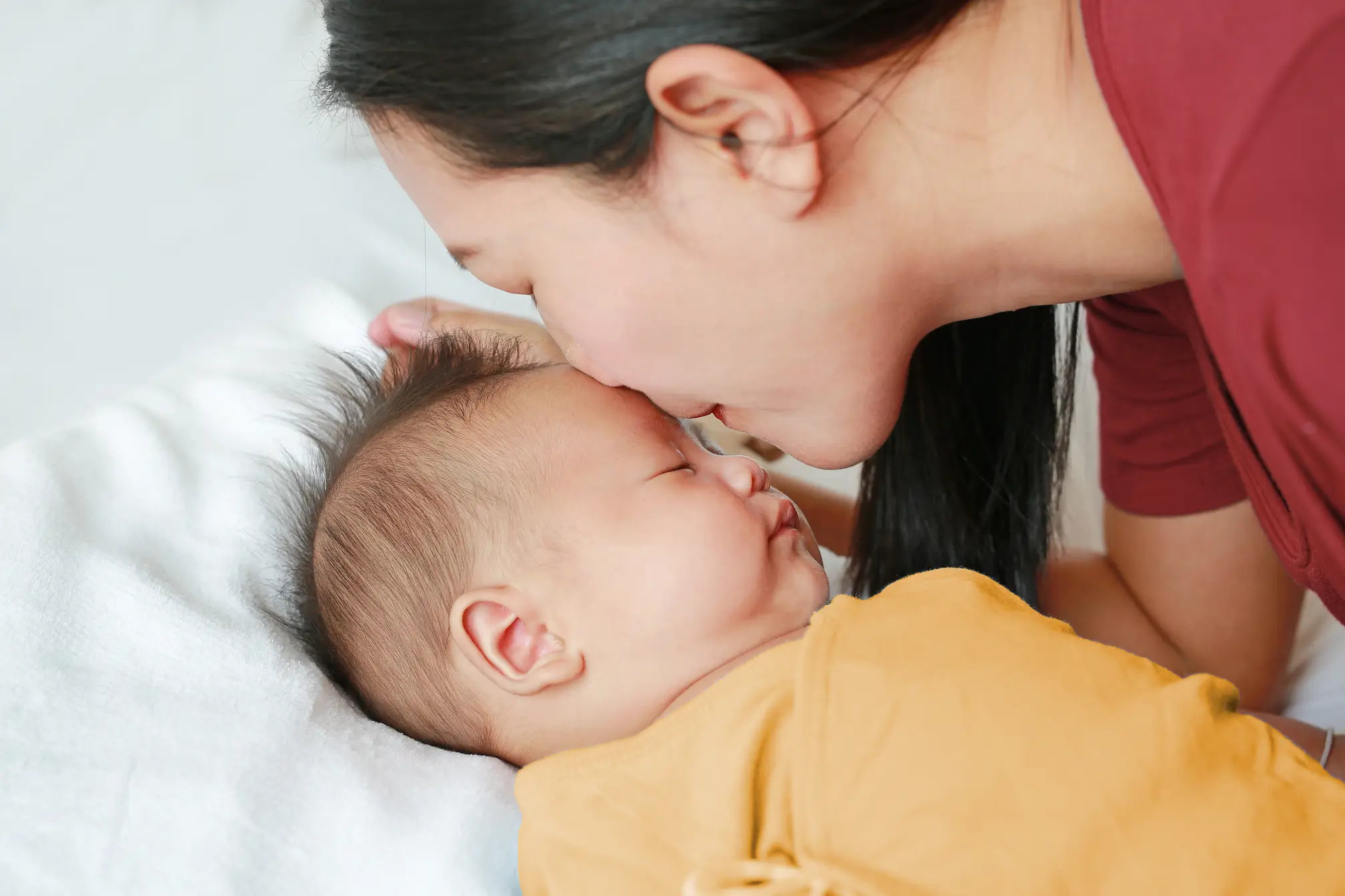 Mother caring for baby