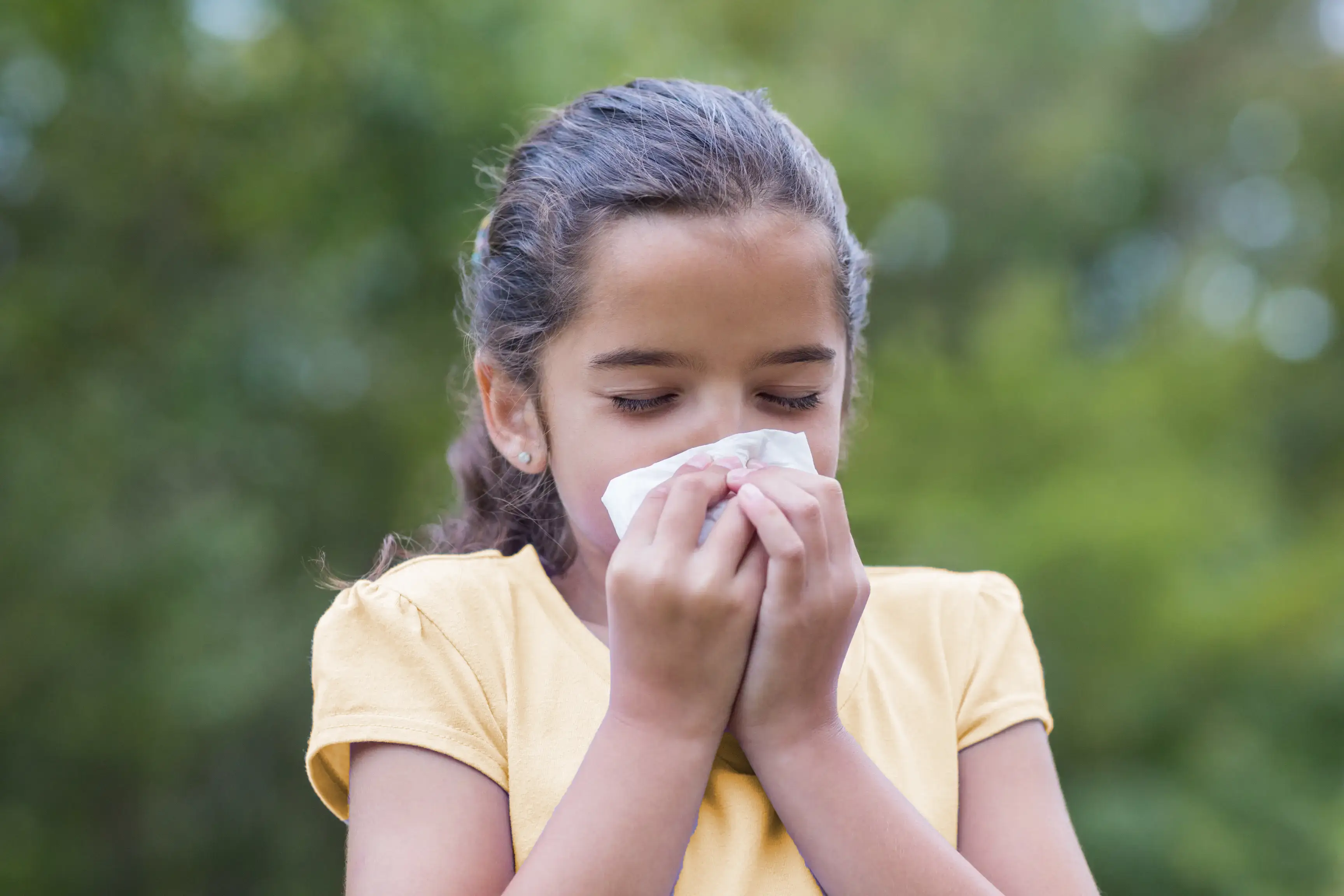 Child blowing their nose