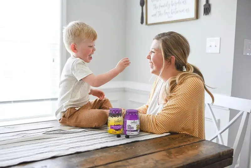 Woman playing with toddler