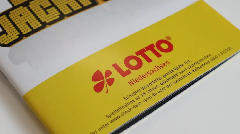 Suchthinweis auf einer Broschüre von LOTTO Niedersachsen