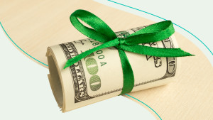 Money bundle tied with ribbon