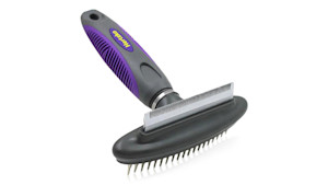Pet grooming brush that sheds too