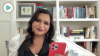 Mindy Kaling Texting With theSkimm holding phone smiling to camera 