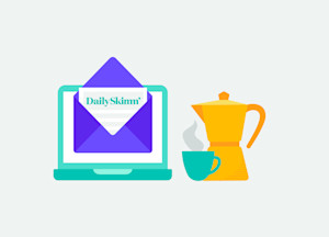 Coffee pouring in a cup next to laptop with envelope on the screen