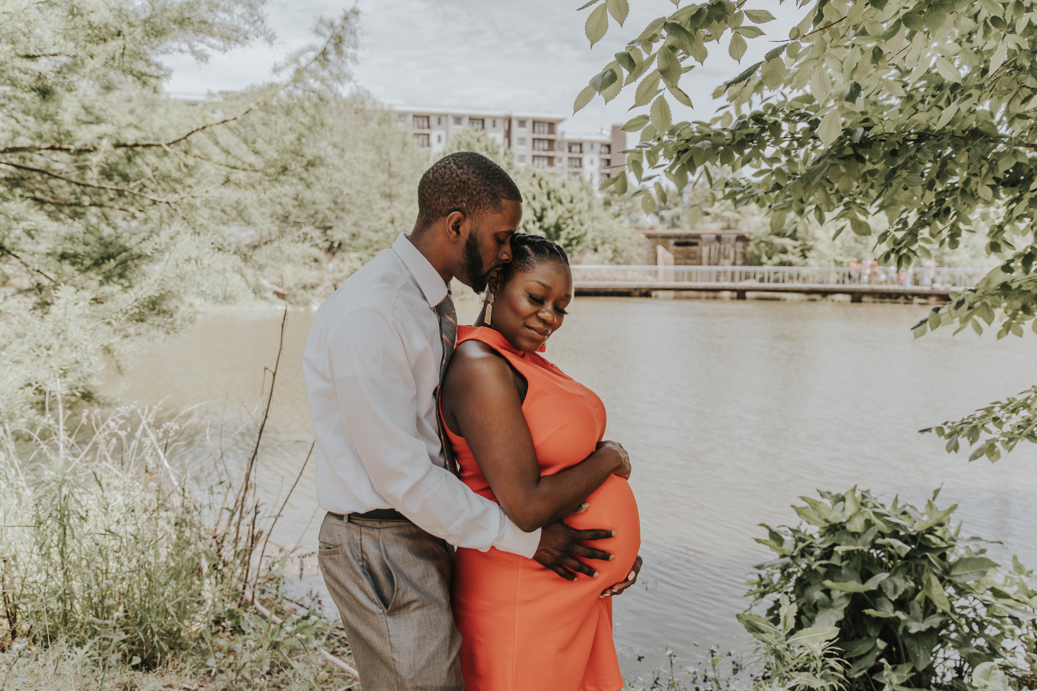 Maternity session by the reflecting pond at Historic Fourth Ward Park in Atlanta by a Shoott photographer.