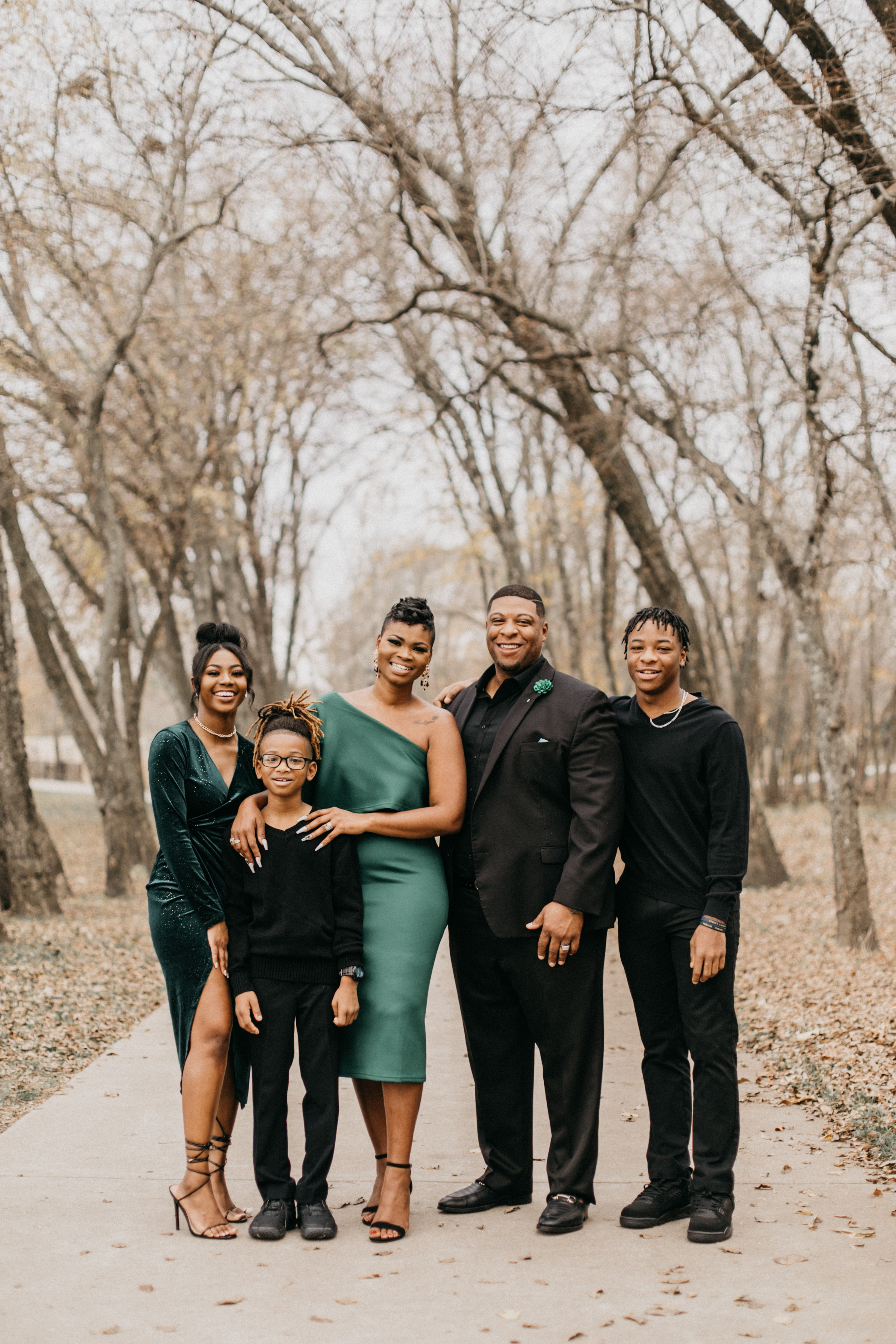 Holiday Shoott family photo outfits in jewel tones.
