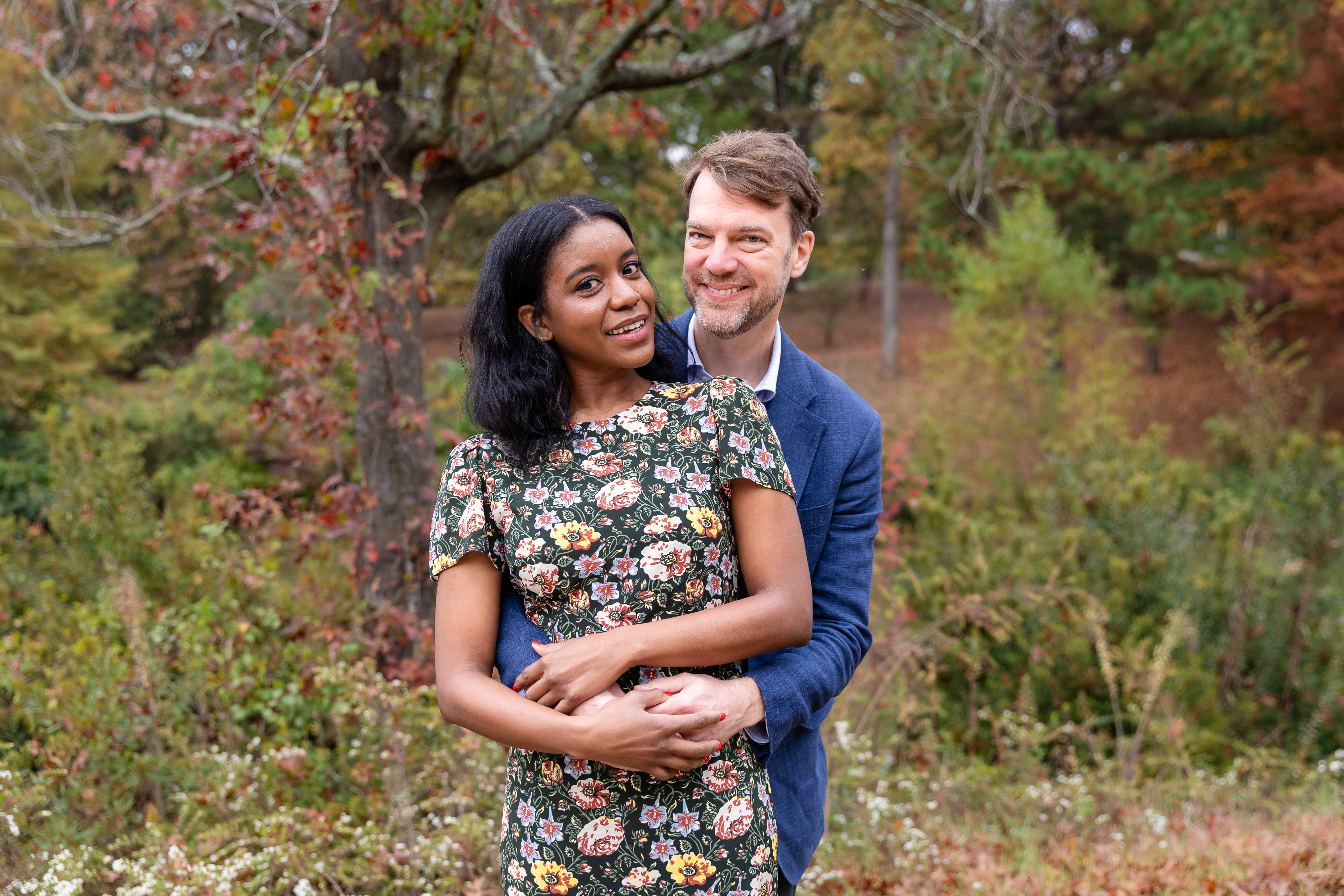 Couple during a fall engagement photoshoot beneath mature oak trees at Grant Park in Atlanta, captured by a Shoott photographer.
