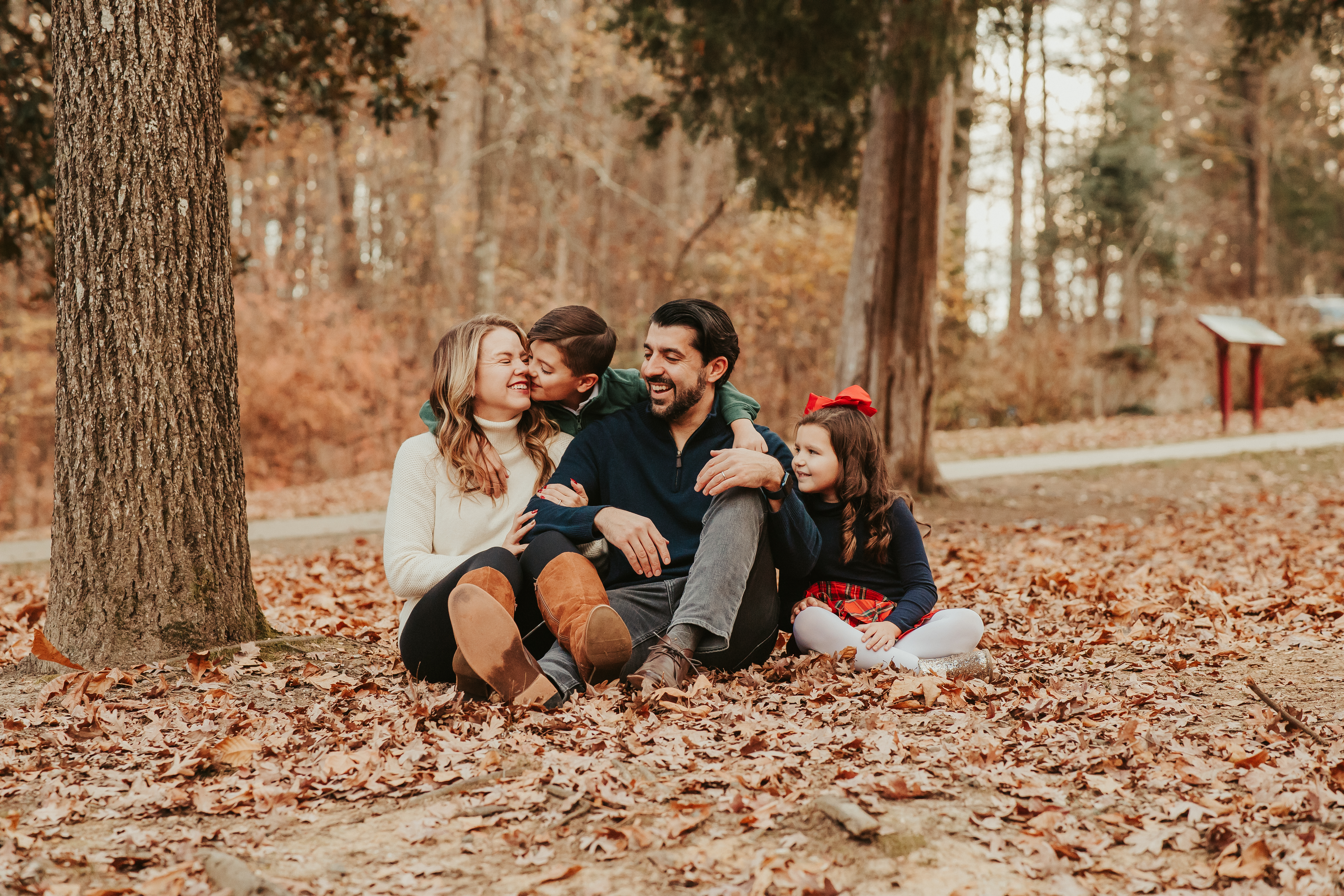 Wooded trails and lakeside scenery at Squirrel Lake Park in Matthews during a Shoott family portrait session.