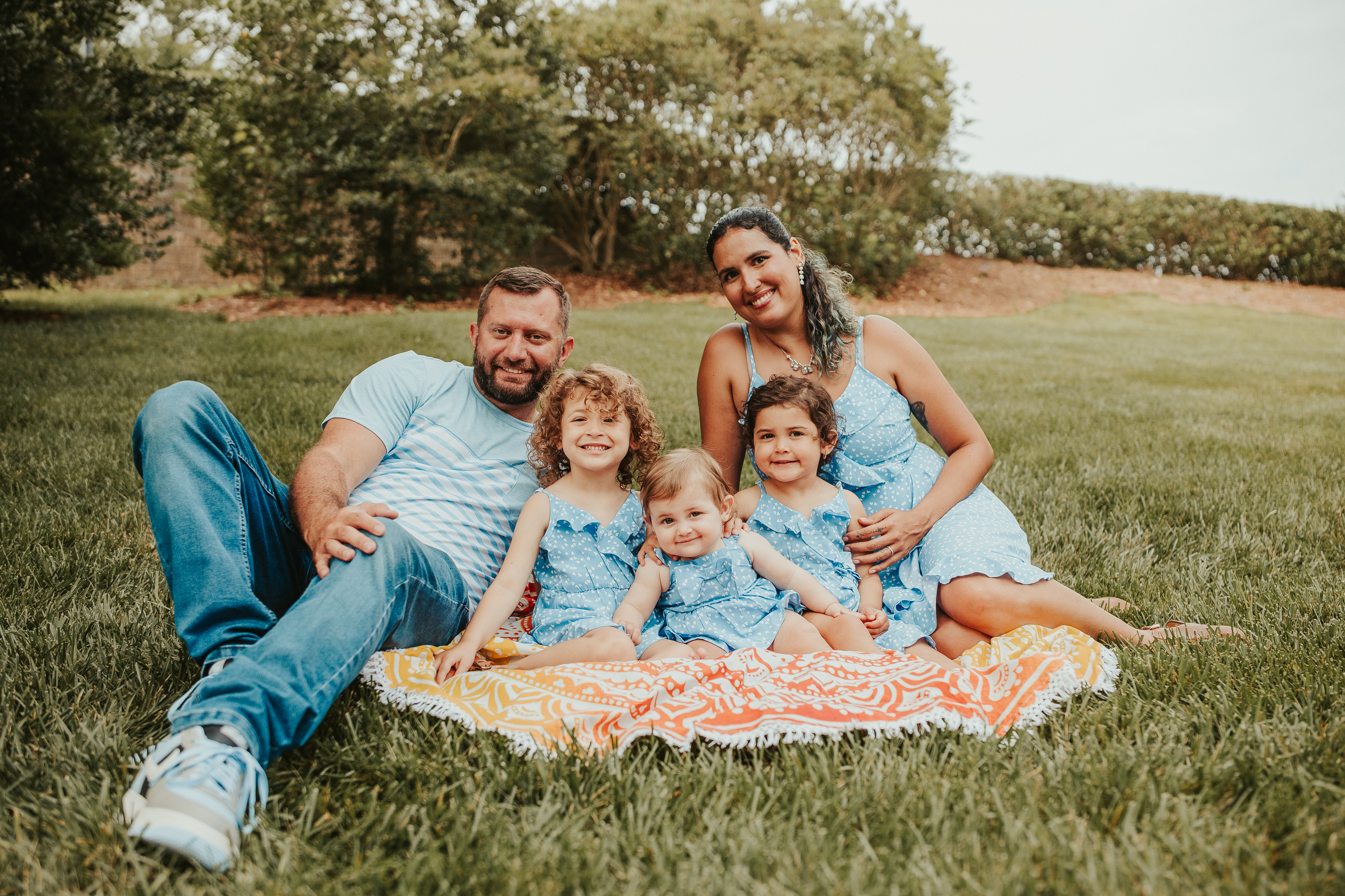 Walking paths and landscaped green space at Ballantyne Cullman Park during an outdoor Shoott family photo session.