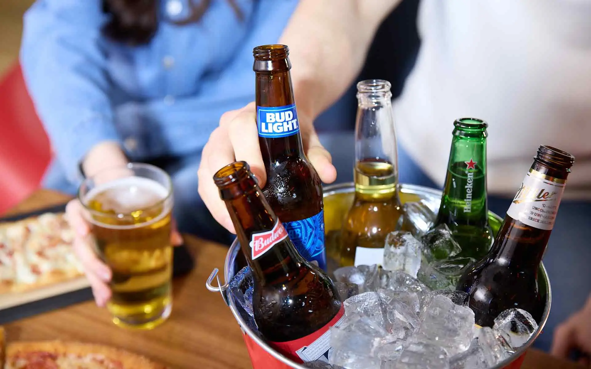 Bucket of beer at a bowling center.