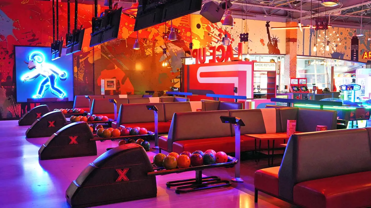 Several Lucky Strike bowling ball returns with spacious, comfortable seating.