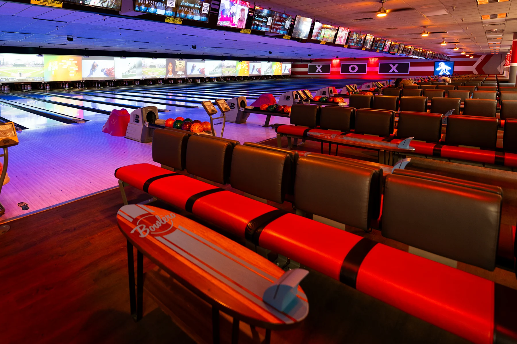 Bench seating and bowling lanes.