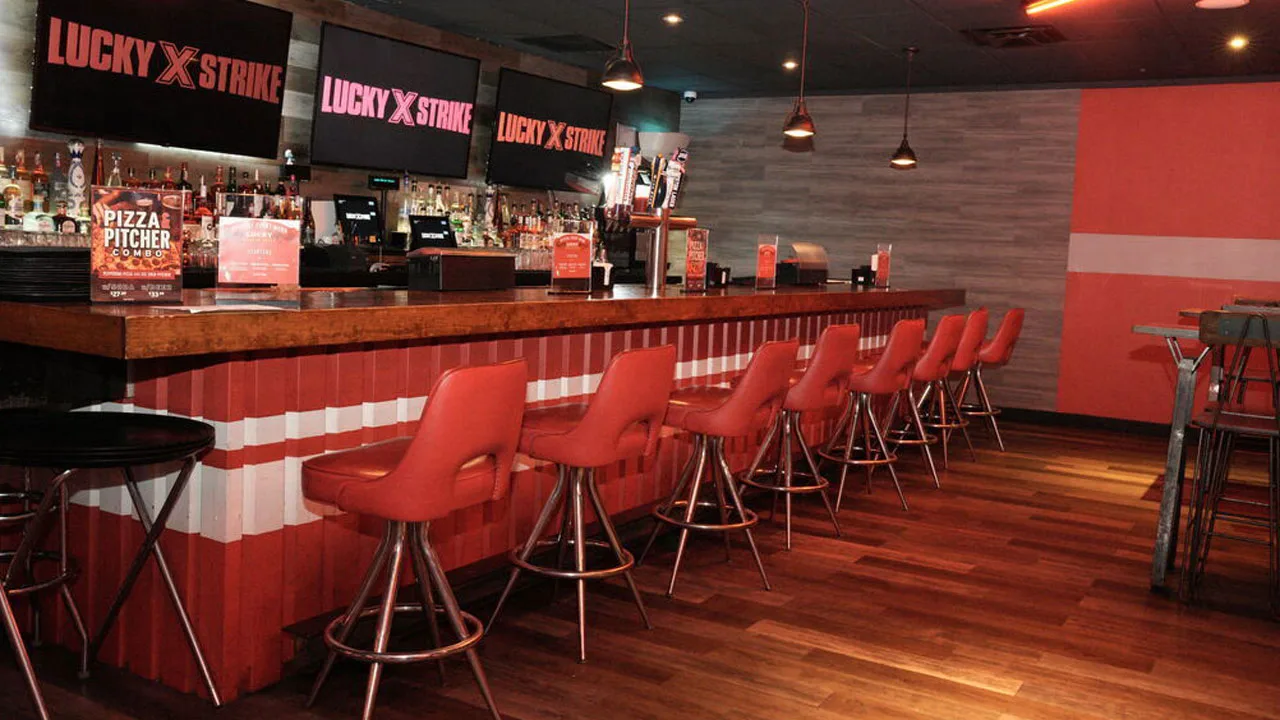 Beautiful bar with large TV screens above the bar