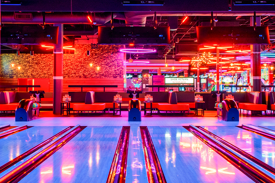 Colorful bowling center with black light lanes