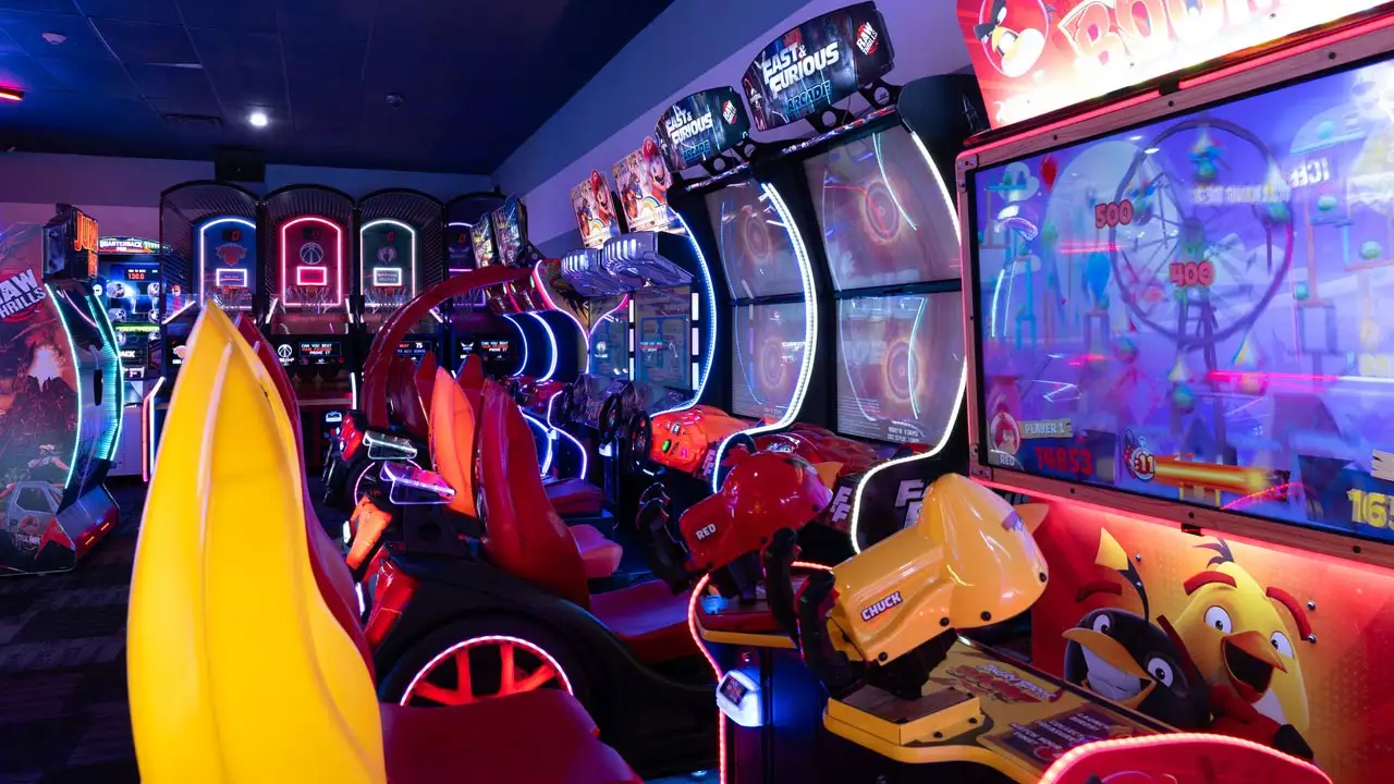 Large and colorful arcade games in a beautiful arcade room