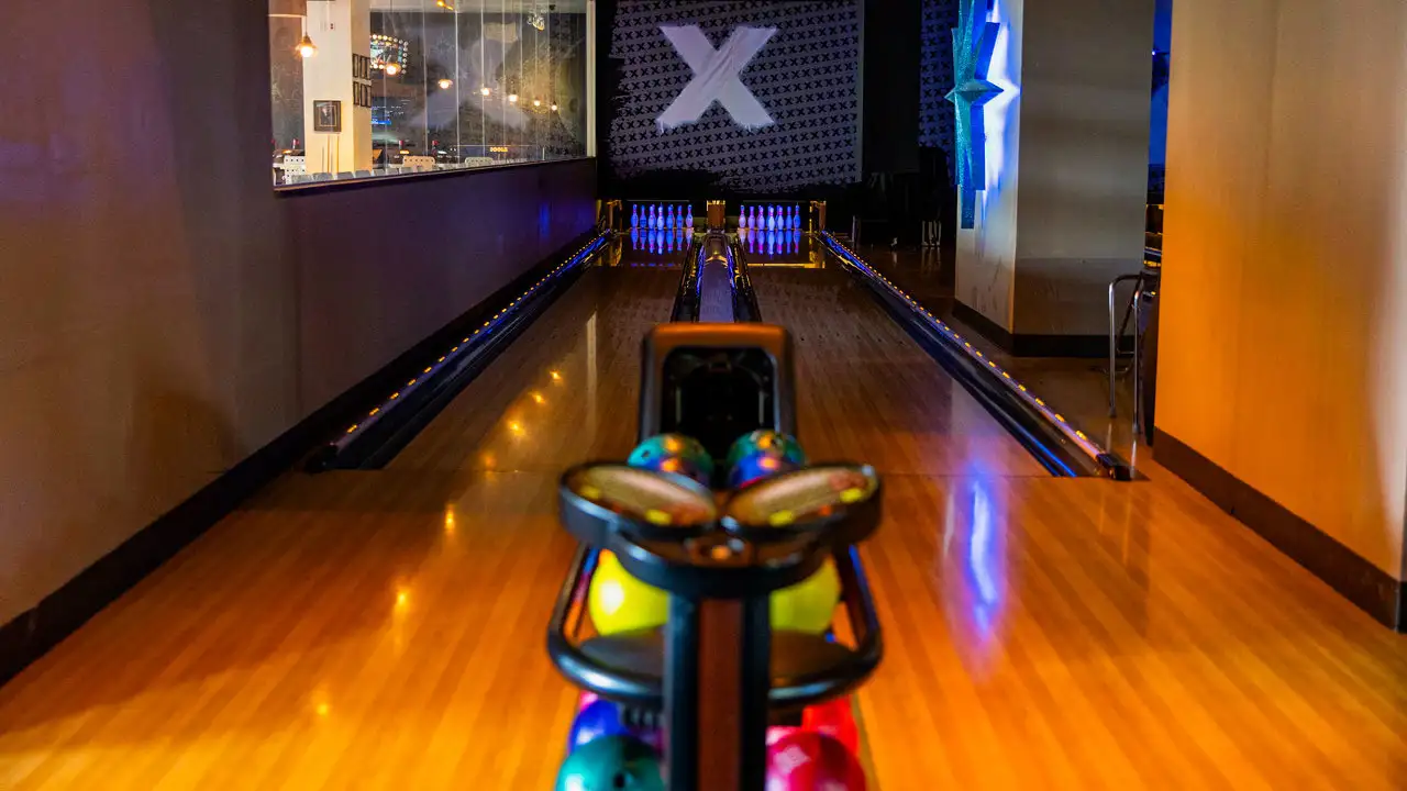 Cozy private lane with colorful bowling balls and beautiful approach.