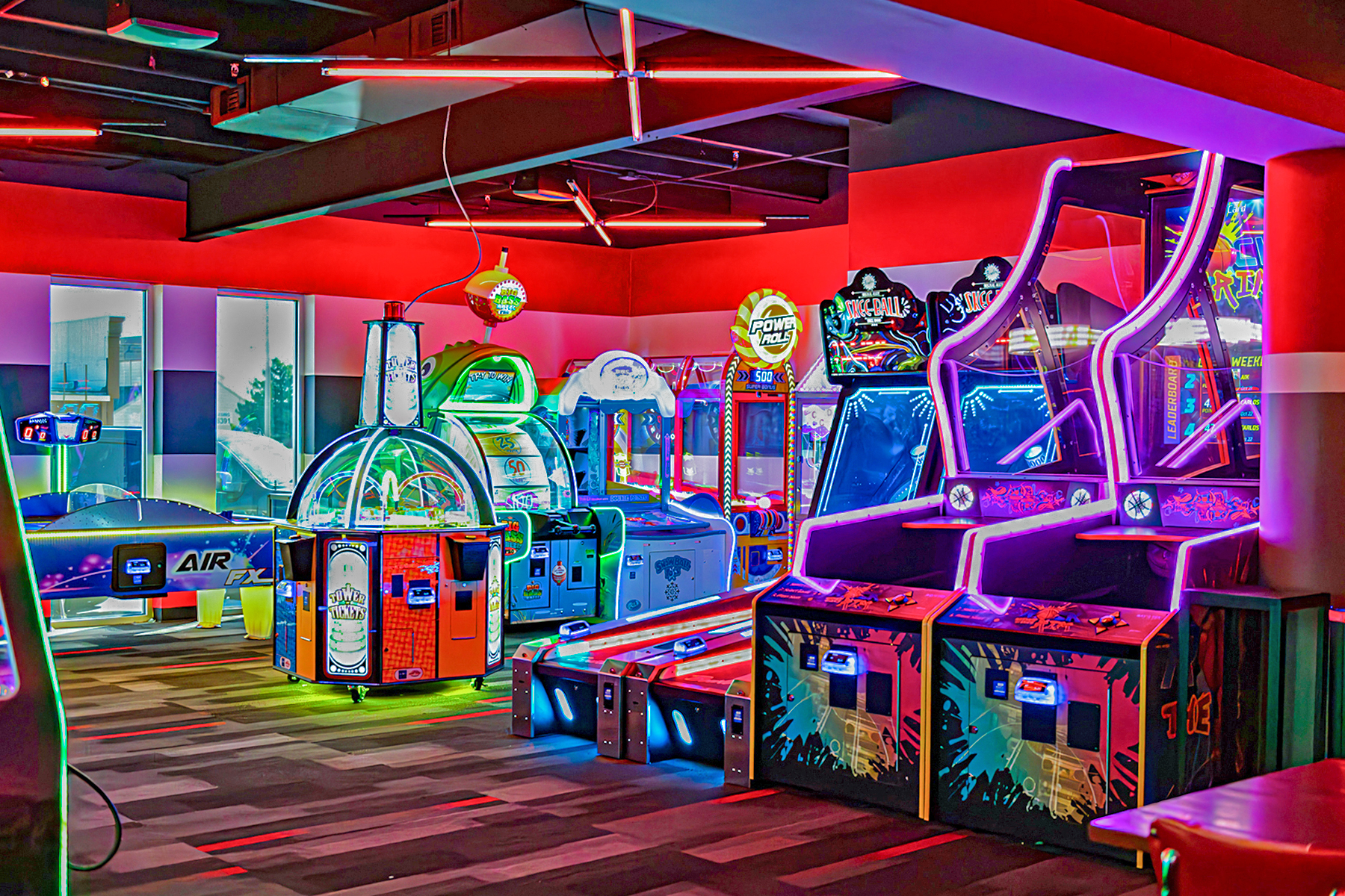 Large, colorful arcade with lots of big games