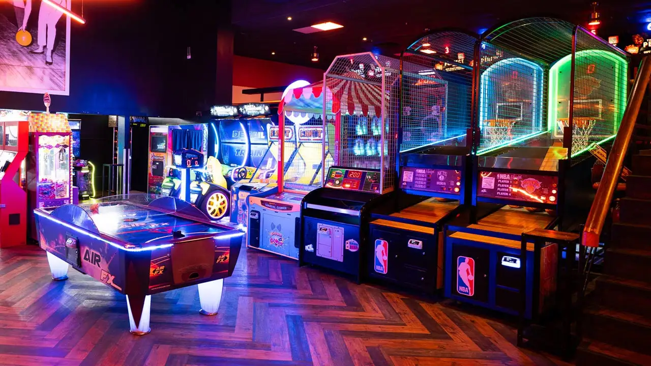 Large and colorful arcade games in a beautiful arcade room