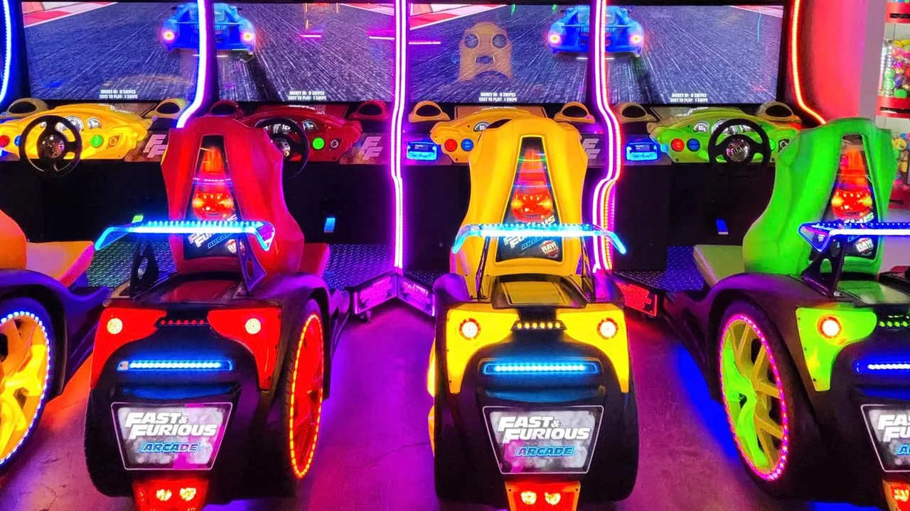 Large, colorful, and well lit Fast and Furious arcade games