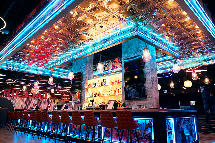 Large, beautiful bar with lots of seating
