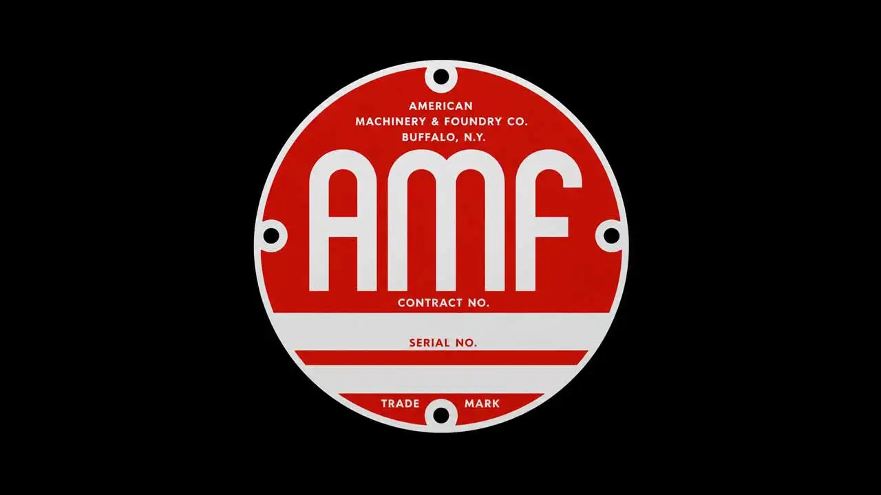 AMF vintage circular logo on a black background with red center and gold lettering reading American Machine & Foundry Company, Buffalo New York