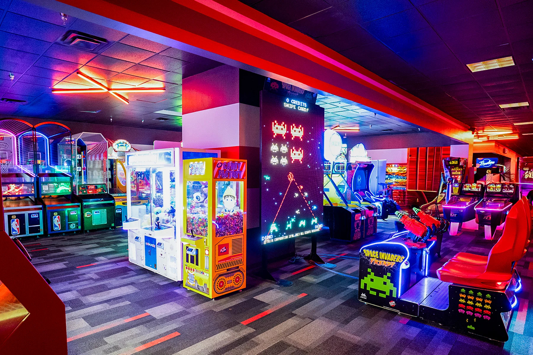 Large, colorful arcade with lots of big games