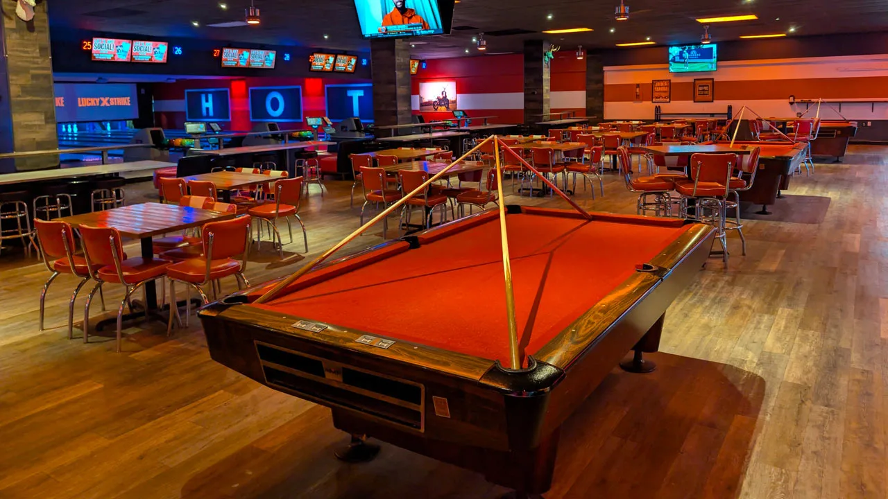 Beautiful billiards table in a large, comfortable room