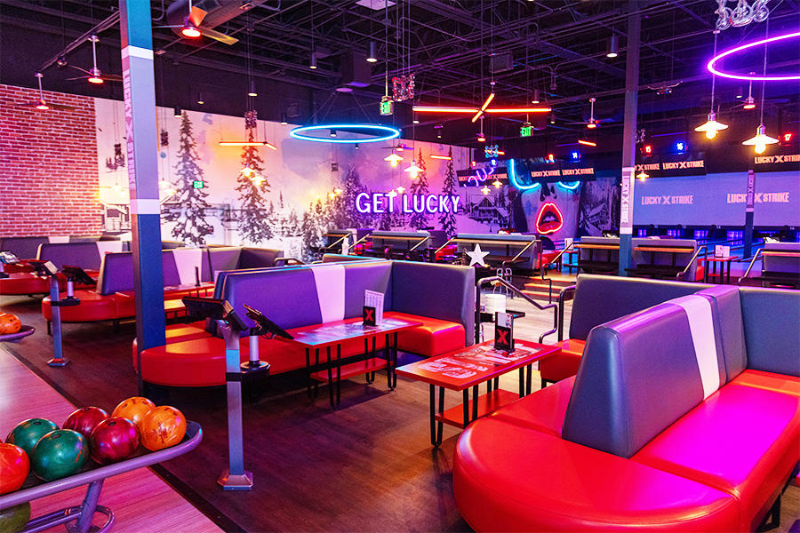 Colorful and fun bowling center with neon lights and large murals
